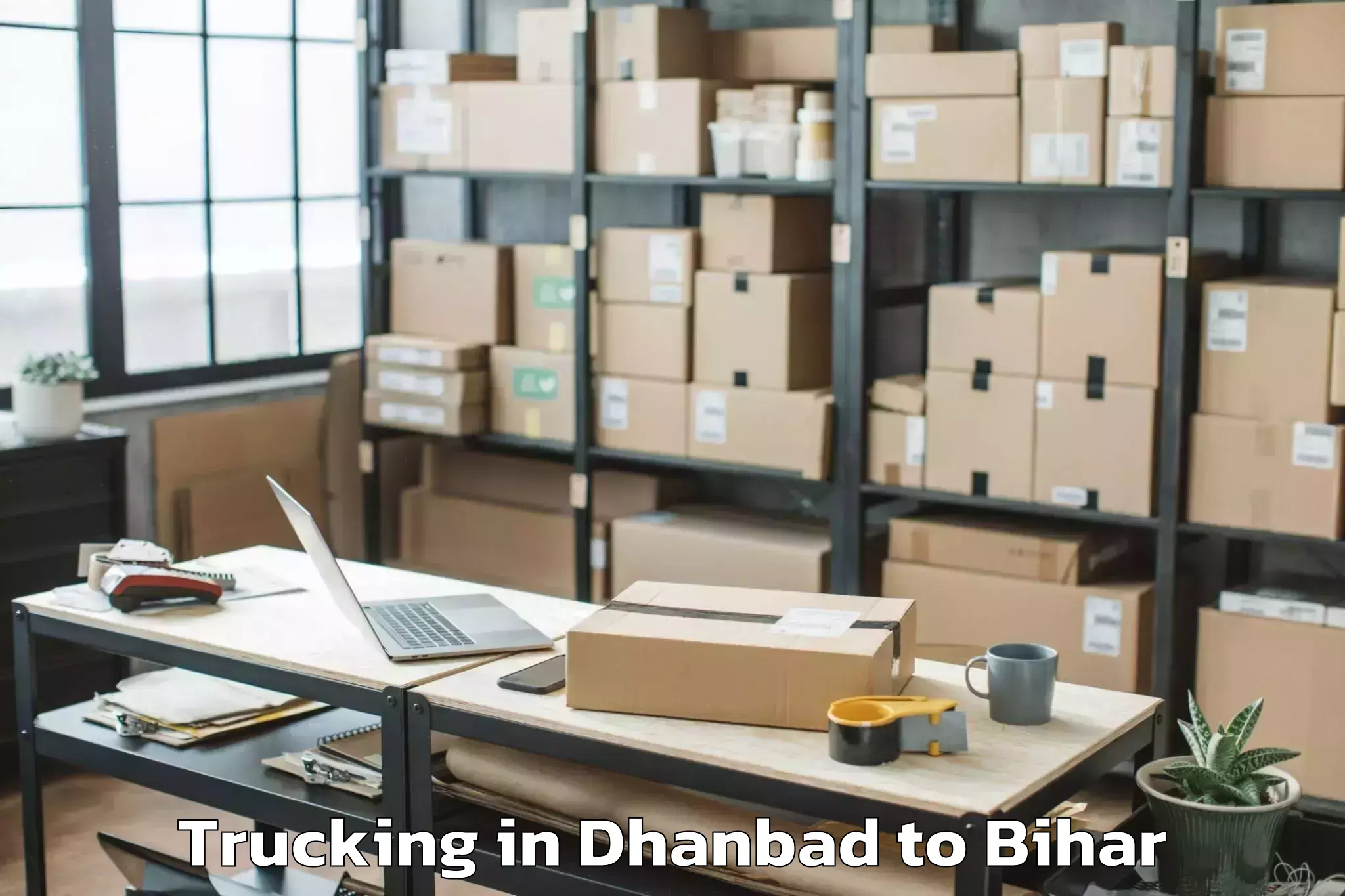 Easy Dhanbad to Ghoghardiha Trucking Booking